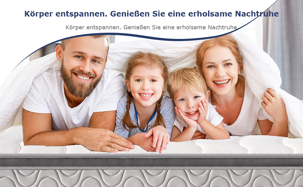 a family lying on a mattress