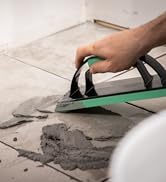 UltraLight Grout Float spreading grout on a tile floor