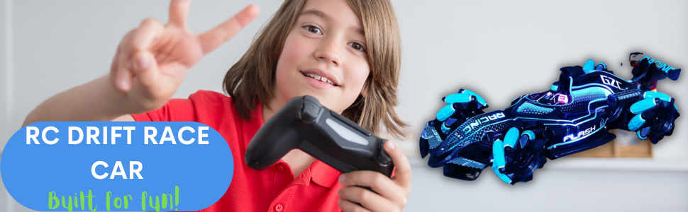 Boy with game controller in hand showing a peace sign with remote control car