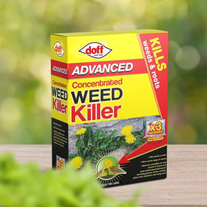Box of Doff Advanced Concentrated Weed Killer. Red and yellow packaging shows product name, brand, and claims 'Kills roots & all'. Features dandelion illustration.