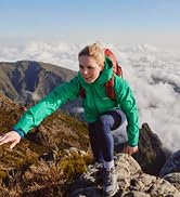 lady climbing in green jacket