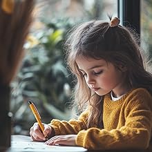 Emma Writing a Story About Max