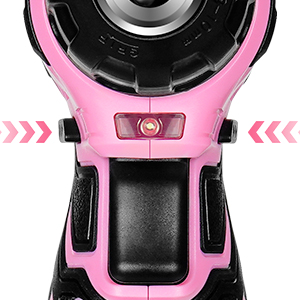 Close-up of a pink and black electronic device with a circular display and side buttons, possibly a smartwatch or fitness tracker.
