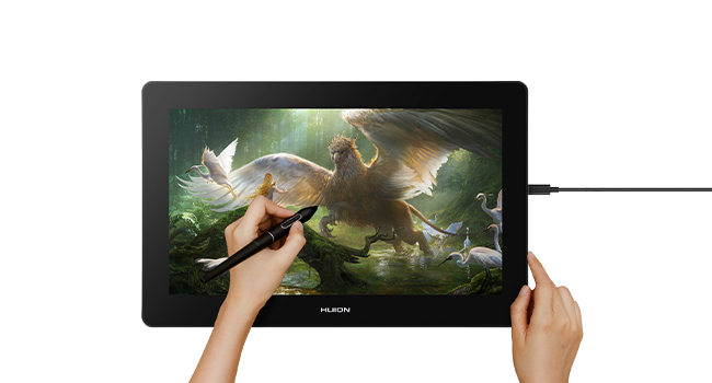 Tablet device with stylus being used to draw on screen. Image shows fantasy scene with flying creatures.