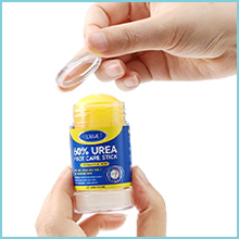 Sequential images showing a small tube or container being opened and contents being squeezed or applied, possibly an adhesive or sealant product.