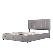 Gray upholstered bed frame with a tufted headboard. Platform-style base with visible wooden slats for mattress support.