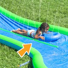 Kid on HearthSong Double Lane Water Slide