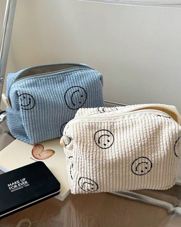bolsa de maquillaje de cara sonriente