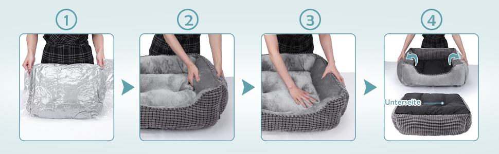 Eine Person stellt ein Hundebett in ein Haustierbett