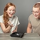 2 friends roll dice in a tray