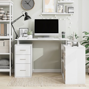 a white desk with a computer on it.
