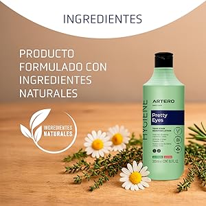 ARTERO Pretty Eyes Eye Cleaner and Tear Zone Removes Tear Spots from Dogs and Cats, Eye Cleaner Dogs, Natural Ingredients, Hygiene for Dogs and Cats. 18 Artero Pretty Eyes, 300 ml. Botella de color verde claro con ingredientes naturales, rodeada de flores de manzanilla y vegetación sobre una superficie de madera
