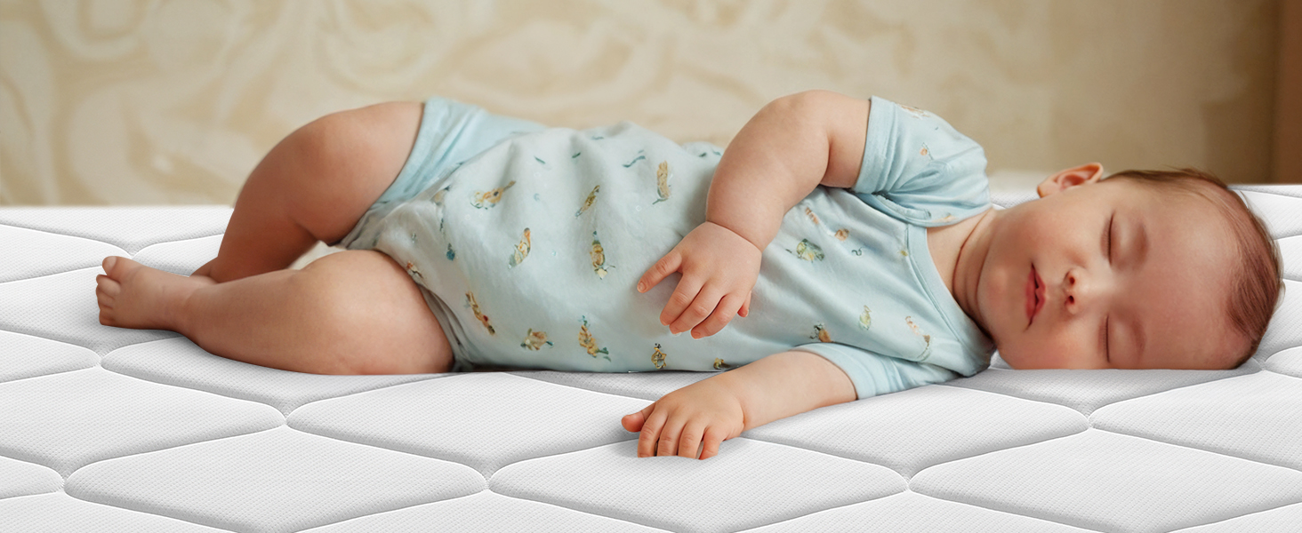 White quilted mattress surface showing its comfort and support features, with demonstrative sleeping pose on its surface.