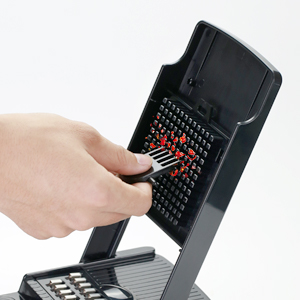 Easy to clean, just use claws and brushes to scrape and sweep the residue on the platen and blades