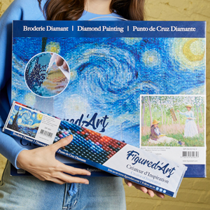 woman holding 2rolled and framed diamond painting packaging