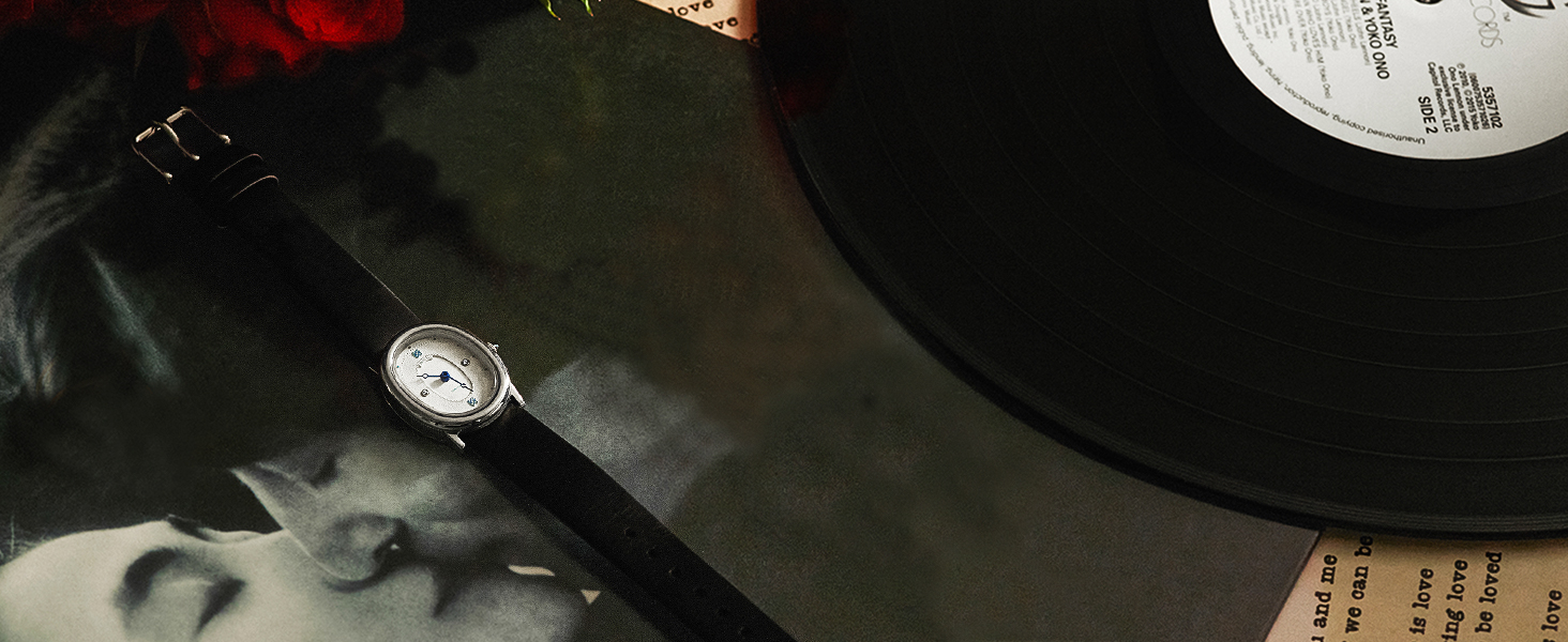 PASCAL Women&#39;s Oval Bubble Diamond Watch black leather watch