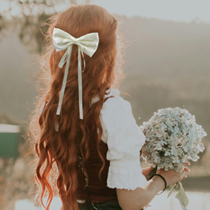 white bow hair clip