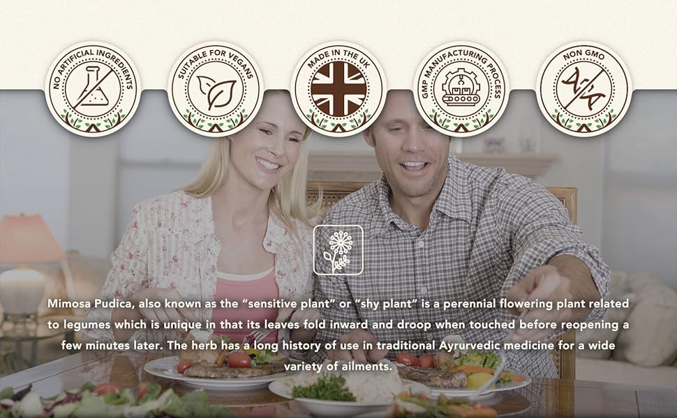 a couple smiling and holding a plate of food.