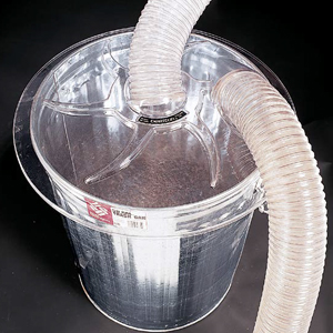 A metal planer collector with plastic hood and hoses