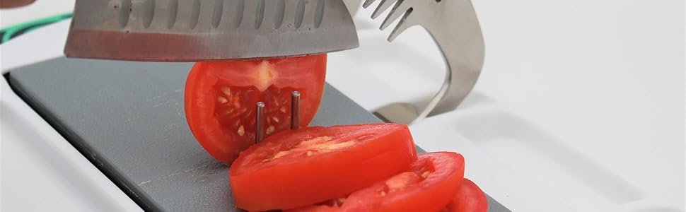 Tomato being sliced