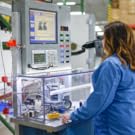 Woman in front of machine running test
