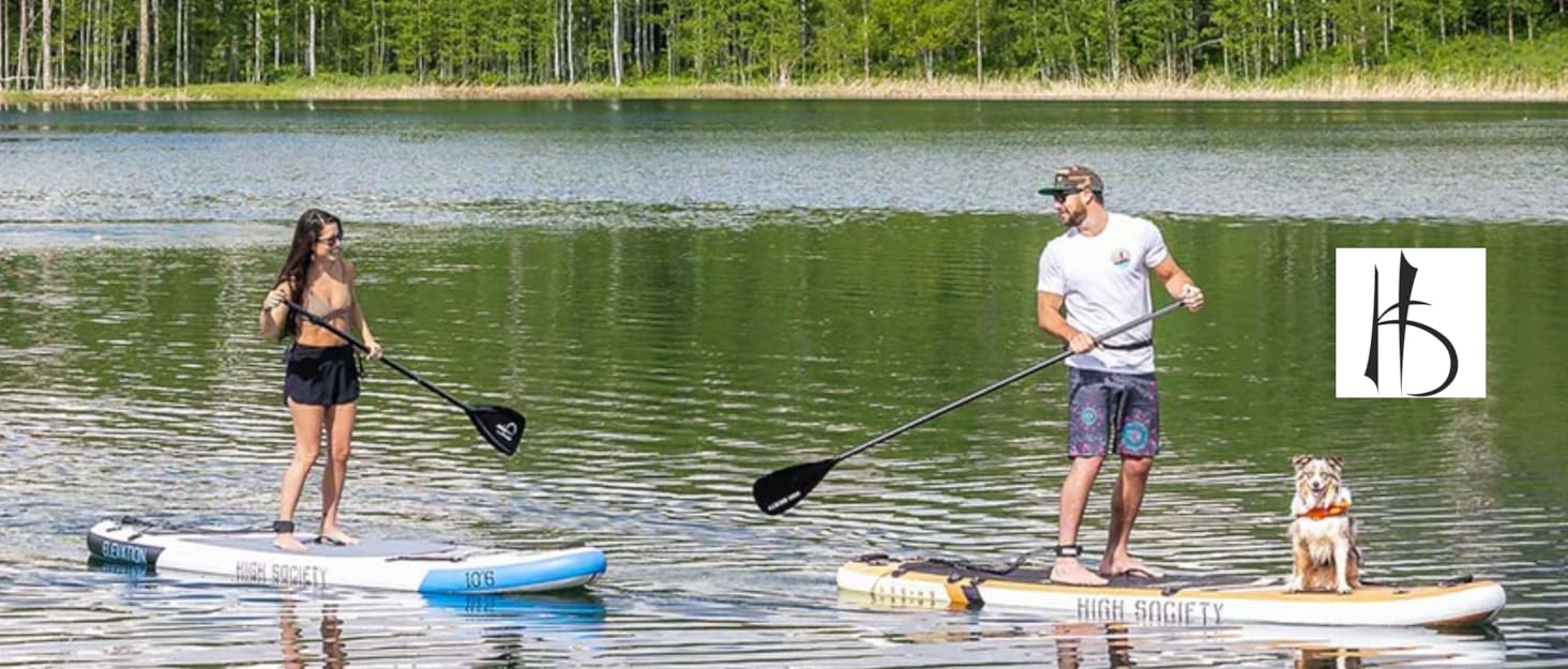 Paddlboarding Couple with their dog on a lake