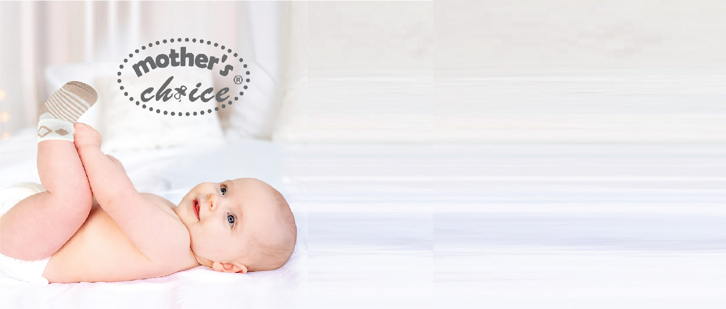 Baby lying on back on white surface, wearing diaper. 'Mother's Choice' logo visible in corner.
