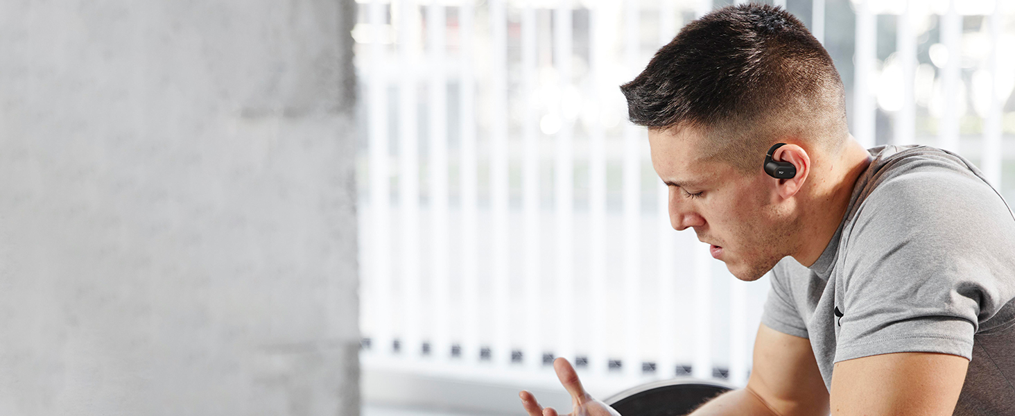 Multiple views of people sitting at desks or workstations, demonstrating proper ergonomic posture and workspace setup.