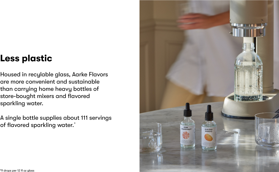 Aarke Flavor Drops on counter near Carbonator Pro. Both promote sustainable lifestyle.