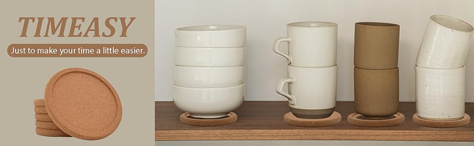 Multiple cups and bowls are placed on cork coasters on a table top.