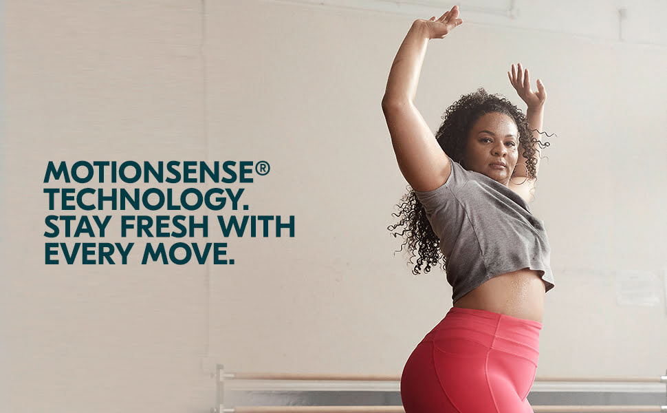 Image of woman moving with her hands above her head