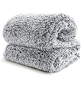 Close-up views of gray microfiber drying mat with textured surface, shown folded and unfolded in different positions.