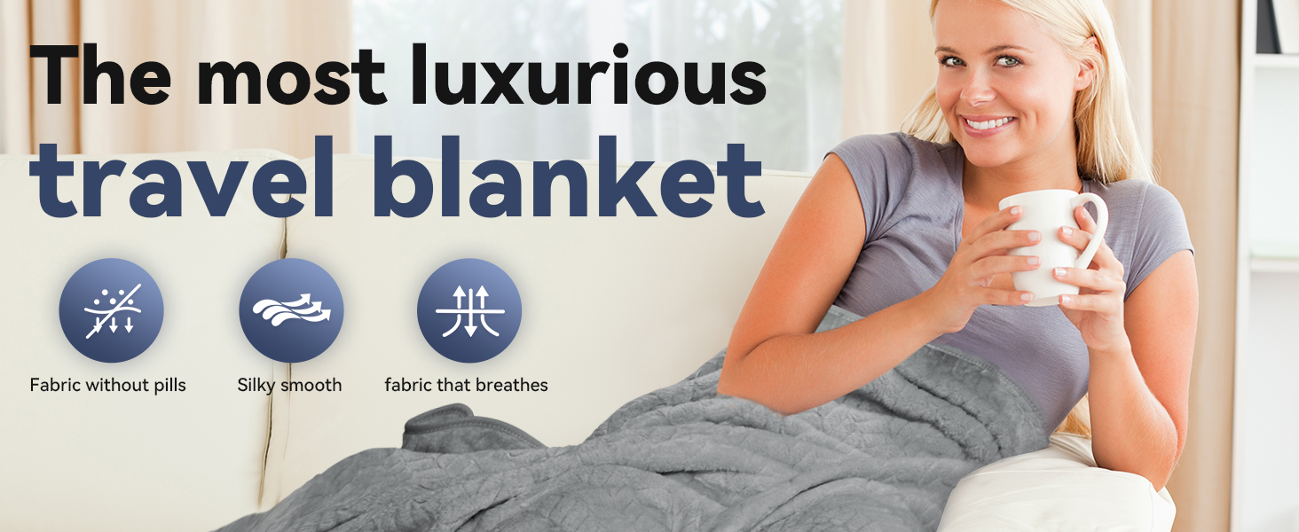Soft travel blanket that is silky smooth and great for travel in Gray
