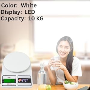 White digital kitchen scale with an LED display showing weight, with a 10 KG capacity