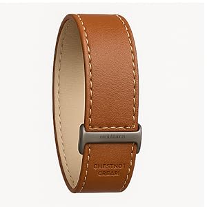 WHOOP 5.0 with Chestnut Cream strap on wrist