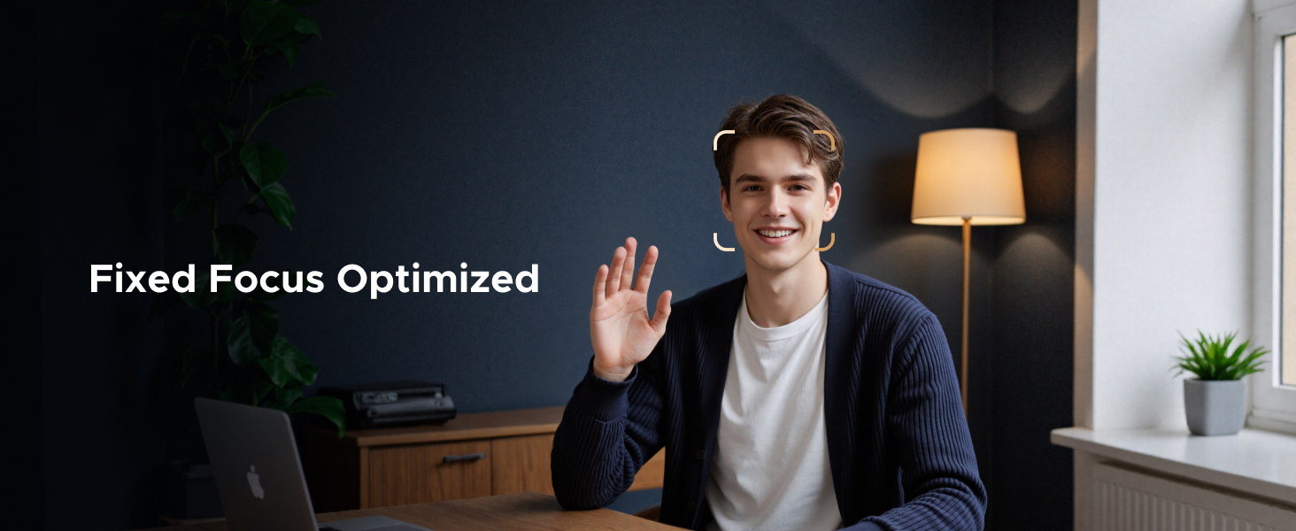 Text reads 'Fixed Focus Optimized'. Interior room setting with window, desk, and lamp, demonstrating lighting or camera optimization features.