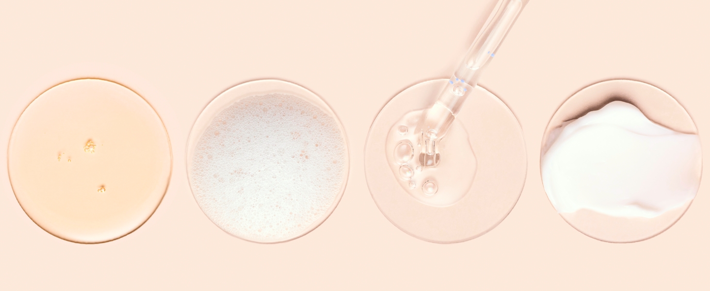 Assortment of natural oils being expertly blended to create organic cosmetic products