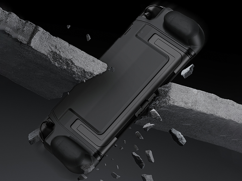 Étui de protection noir pour appareil de jeu portable, doté d'un design robuste avec des bords surélevés et des poignées texturées. Montré sur une surface de béton cassée, ce qui suggère une durabilité.