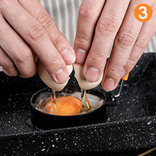 Add the cracked egg and break the yolk