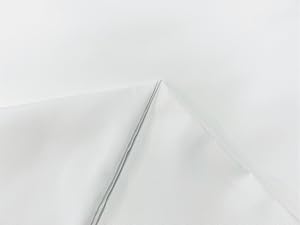 a white fabric with a thin metal rod