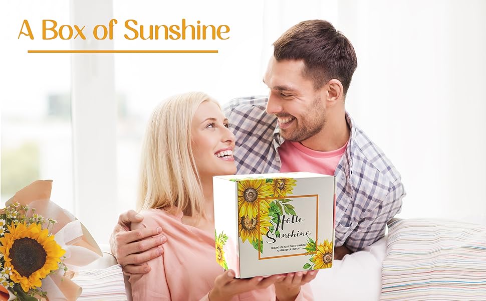 Geschenkbox mit Sonnenblumen-Design und dem Text „A Box of Sunshine“, dargestellt in einer Lifestyle-Umgebung mit