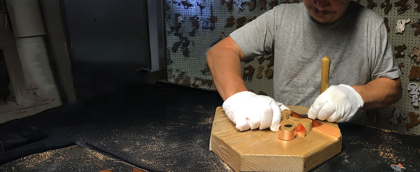 Artisan crafting the Gingerbread Boy Cookie Cutter in our small Indiana workshop