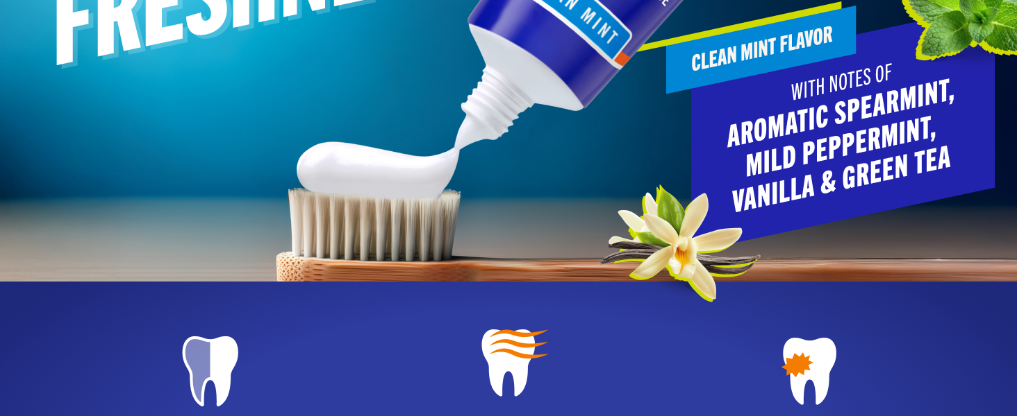 Fluoride toothpaste gel being squeezed onto a toothbrush with mint and vanilla denoting freshness