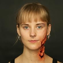 alcohol drying blood and sfx prosthetics on woman's face and neck