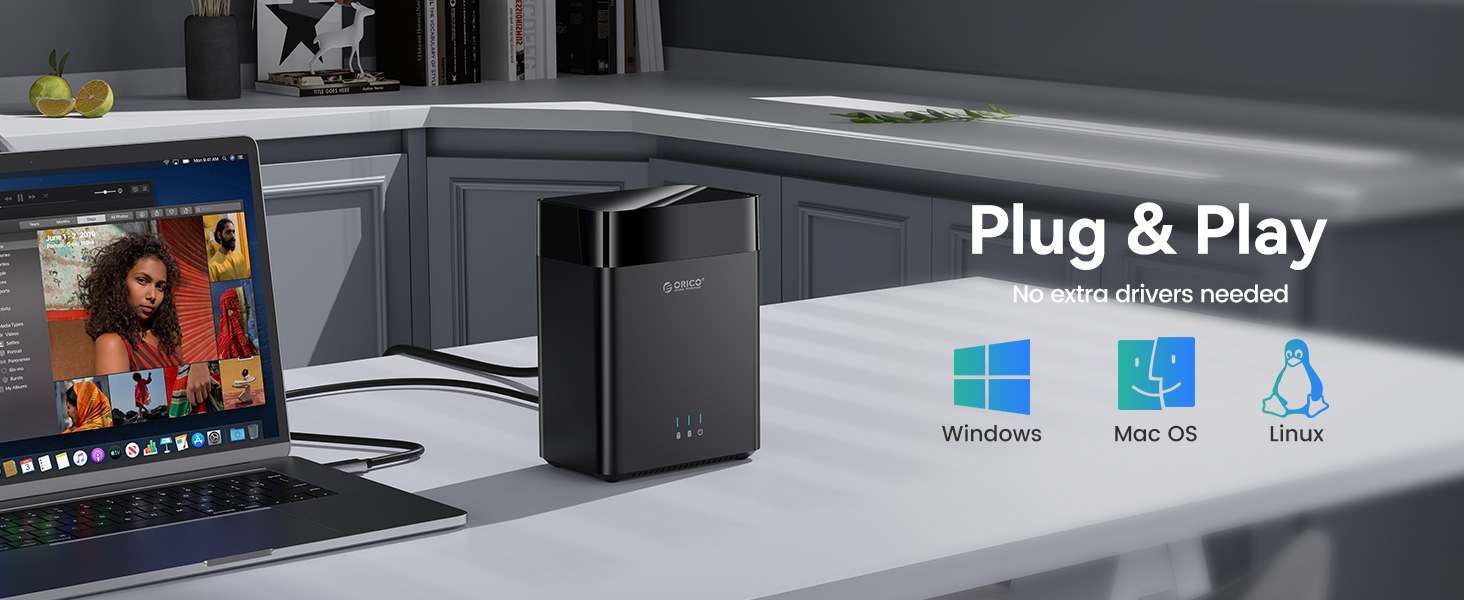 a laptop on a table with the windows server logo on the side.