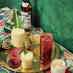 Photo of Coquito, Mavi and Hibiscus Cooler, and Roasted Pina Colada 