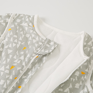 Close-up shots of white textured surface with small gold/yellow accent points, showing material detail from multiple angles.