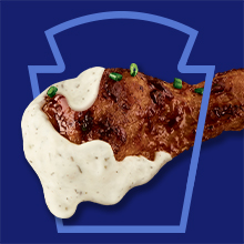 Chicken wing dipped in Heinz Pickle Mayo.