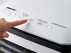 Close-up of a white electronic device with touch-sensitive controls showing finger interaction with smooth surface buttons.