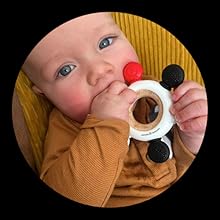 Secure and durable teether ring for effective infant teething relief.